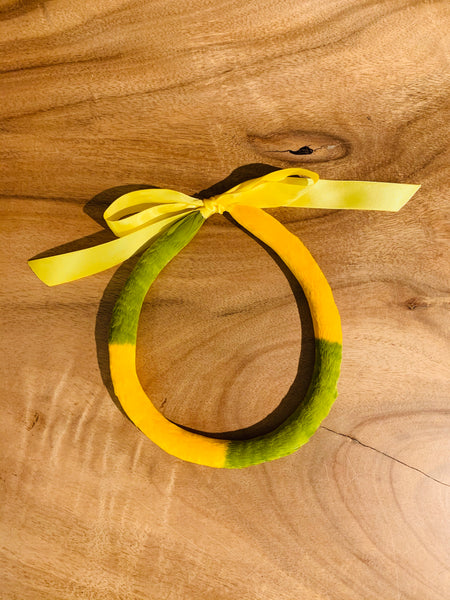 Ilima (yellow orange) with ʻōmaʻomaʻo (olive green)
